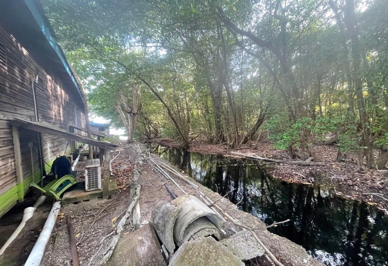 A typical open sewer going to a soak-away beside a cafe on a Windward Island beach photo copyright Dr Howard Dryden taken at  and featuring the Cruising Yacht class