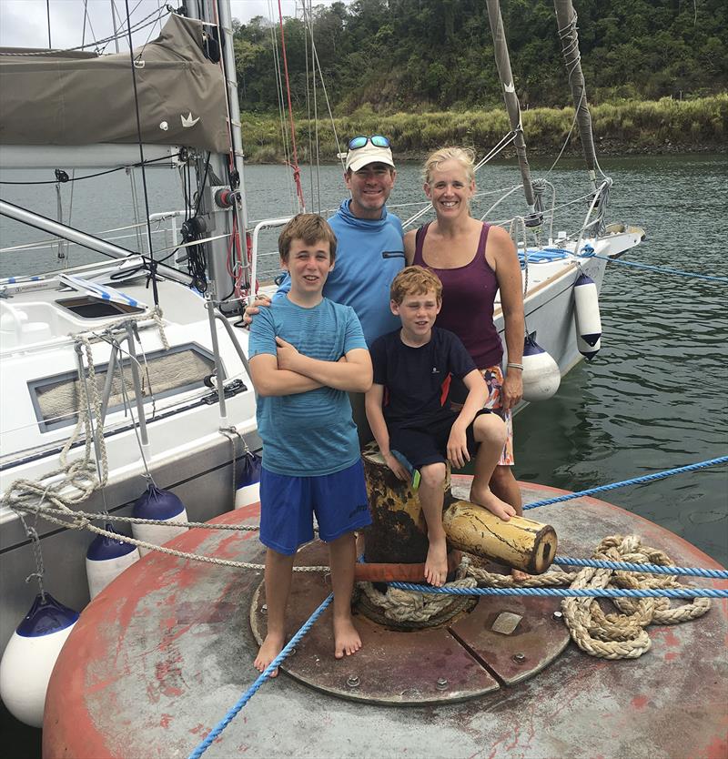 Gatun Lake in the Panama Canal April 2019. Ronan (front, left), Daxton (from, right), Jon (back, left) and Megan Schwartz (back, right) with SV Zephyros in the background - photo © SV Zephyros