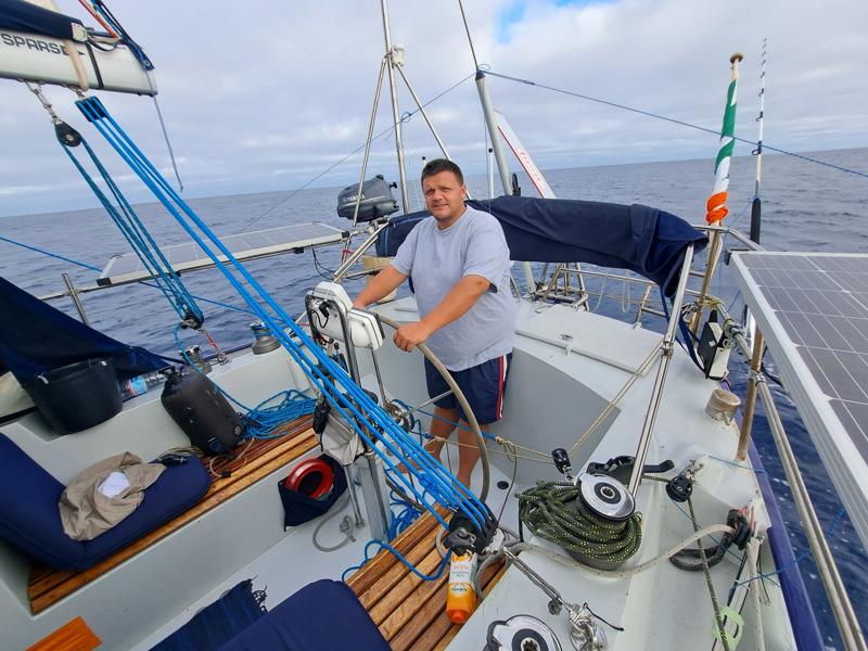 Steve at the helm keeping the Spinnaker full photo copyright Rhys Walters taken at  and featuring the Cruising Yacht class