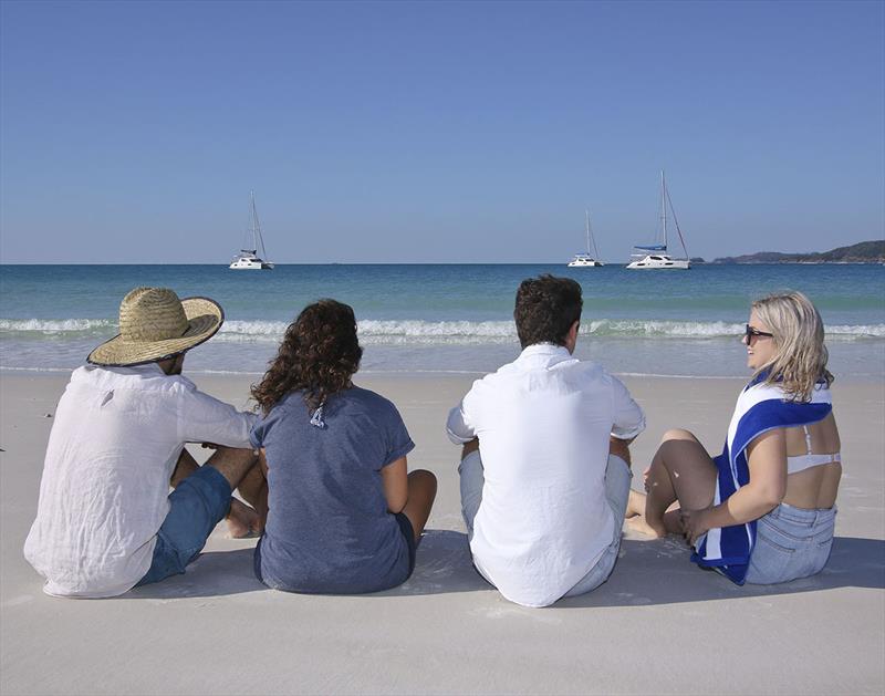 Reconnecting at Whitehaven Beach photo copyright Whitsunday Rent A Yacht taken at  and featuring the Cruising Yacht class