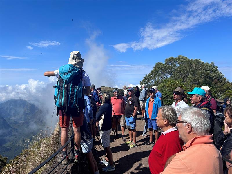 Guide pointing at a cloud - World ARC 2023-24 - photo © World Cruising Club