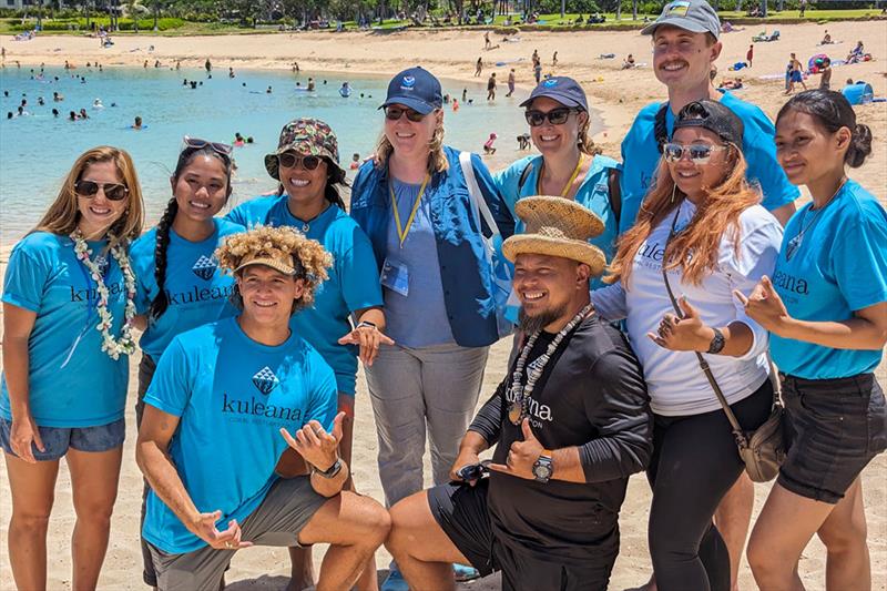 Group photo of COAST participants with NOAA Marine Habitat Resource Specialists Shannon Ruseborn and Lani Watson at an educational outreach event with Ko Olina - photo © Blake Nowack / Kuleana Coral Reefs