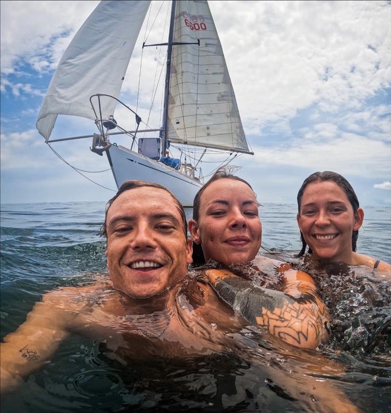 A recent selfie with friends on a windless day; Elixir is in the background photo copyright Max Campbell taken at Cruising Club of America and featuring the Cruising Yacht class