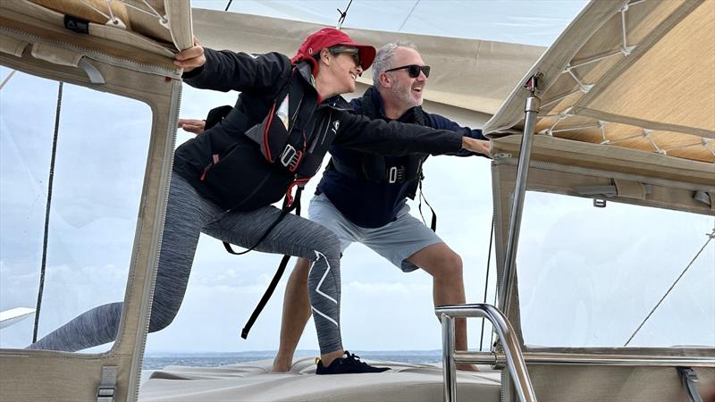 Kim and Duncan pretending to surf past Nazare, famous amidst surfers & known for its 100m waves photo copyright Kim Lawler taken at Ocean Racing Club of Victoria and featuring the Cruising Yacht class