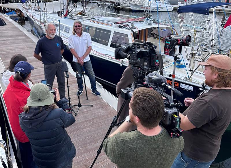 Ken Gourlay OAM and Tristan Gourlay interviewed by the media at the Royal Yacht Club of Tasmania - Blue Moon II circumnavigation photo copyright Tristan Gourlay taken at Tamar Yacht Club and featuring the Cruising Yacht class