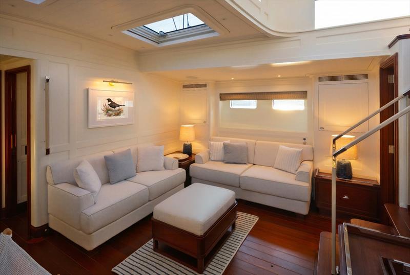 Ouzel, a 95ft superyacht - Facing settees and a central ottoman create a comfortable lounge area in Ouzel's main saloon - photo © Russell Kaye