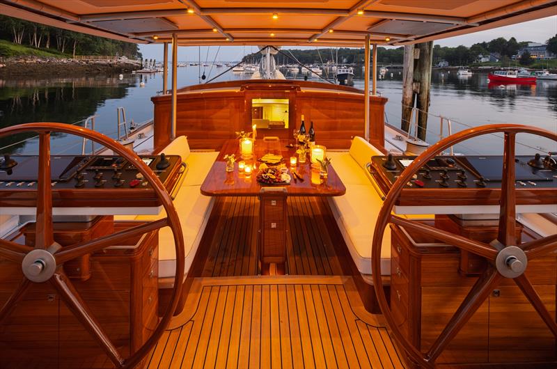 Warm evening light fills the cockpit entertaining area aboard Ouzel photo copyright Russell Kaye taken at  and featuring the Cruising Yacht class