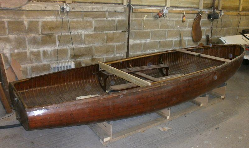 International 14 'Nimbus' - With just a simple brace across the gunwales she was taken from storage to the workshop where the restoration could begin - photo © Simon Hipkin