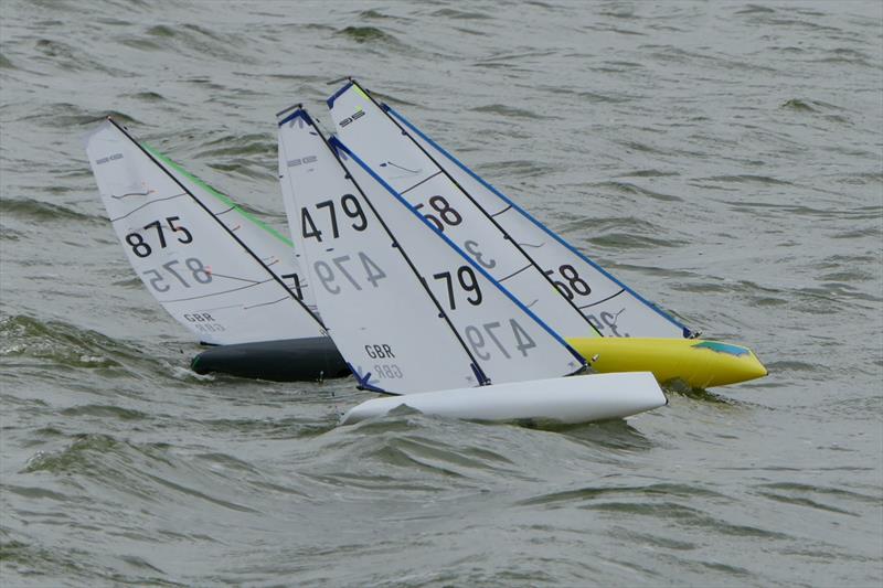Mike Brand, Rob Owns and 38 Dave Adams in close quarters racing from the start - DF95 Summer Series event 3 at Barton's Point photo copyright Alan Houndsell taken at East Kent Radio Sailing Club and featuring the DF95 class