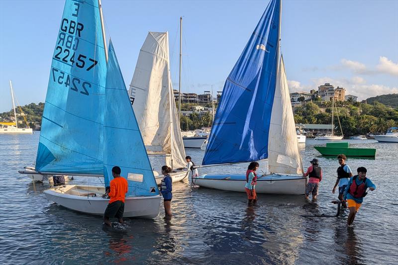 Dinghies donated to St. Vincent and the Grenadines - 7am getting ready to go photo copyright SVG Sailing Association taken at  and featuring the Dinghy class