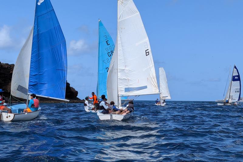 Dinghies donated to St. Vincent and the Grenadines - 9.30am shooting the gap, Bequia Heads photo copyright SVG Sailing Association taken at  and featuring the Dinghy class