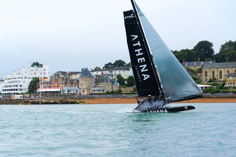 A fly-by of the Royal Yacht Squadron during Cowes Week by the Athena Pathway ETF26 photo copyright C Gregory / Athena Pathway taken at Royal Yacht Squadron and featuring the  class