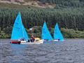  Ges Brown & Julie Moore crossing the Race 5 finish line ahead Of Tim Sadler & Clarissa and Charles Morrish & Luke Hartshorn during the Enterprise Scottish Championship & UK Masters Championship at St Mary's Loch © Katie Masterton