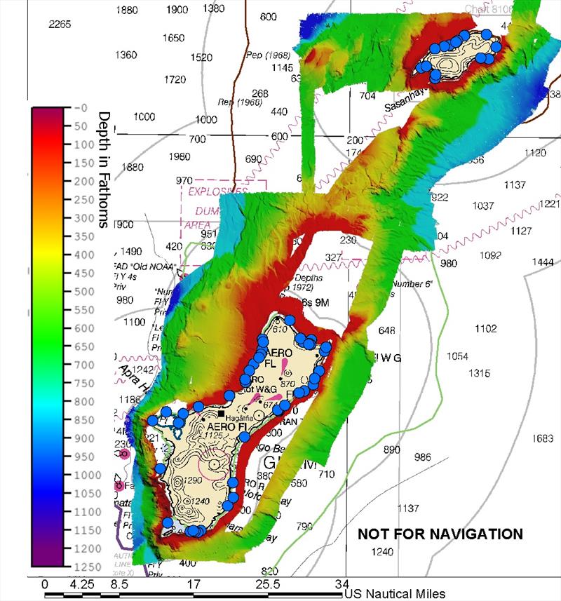 Areas the Rainier has surveyed for both mapping and corals as of May 1, 2022. Blue dots represent completed coral survey sites around the islands. Shaded colors around the islands indicate the range of water depth from the shallow (red) to deep (purple). - photo © NOAA Office of Coastal Survey