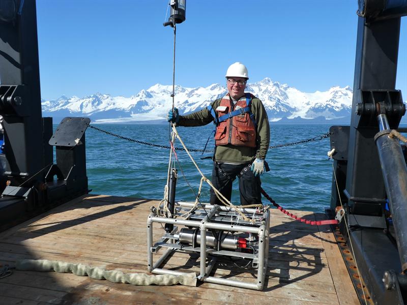 Chief Scientist Pat Malecha operates the winch controller to the drop camera during a dive photo copyright Sean Rooney, NOAA taken at  and featuring the Environment class