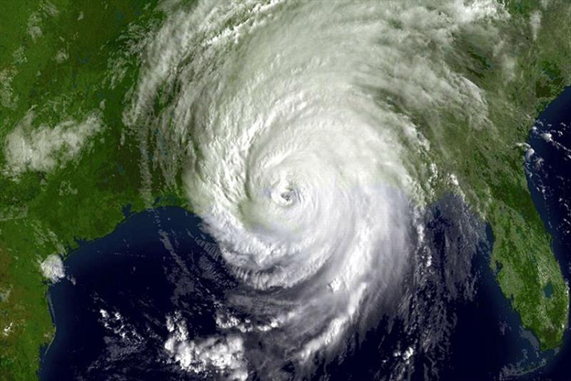Hurricane Katrina actually weakened from a category 5 to a category 3 hurricane shortly before it hit the Louisiana coast, however its hurricane strength winds extended some 200 miles in diameter. - photo © NOAA / NASA GOES Project
