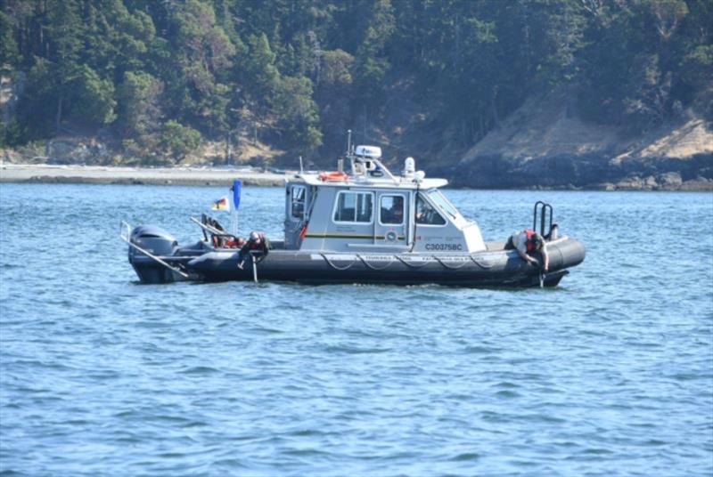 A DFO boat practicing using their oikomi pipes during the transboundary Whale Deterrence drill on August 25, 2022 - photo © NWFSC