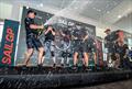 The New Zealand SailGP Team spray Champagne Barons de Rothschild in the Adrenaline Lounge to celebrate their win of the Singapore Sail Grand Prix  © Eloi Stichelbaut/SailGP.