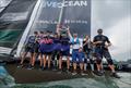 LI Quanhai, President of World Sailing hands the trophy to Peter Burling, Co-CEO and driver of New Zealand SailGP Team, after their victory in the final on Race Day 2 of the Singapore Sail Grand Prix  © Felix Diemer/SailGP