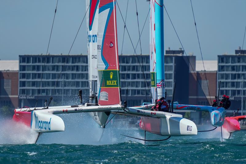 Canada SailGP Team helmed by Phil Robertson and Great Britain SailGP Team helmed by Ben Ainslie in action T-Mobile United States Sail Grand Prix, Chicago at Navy Pier, Lake Michigan, Season 3 - photo © Bob Martin/SailGP