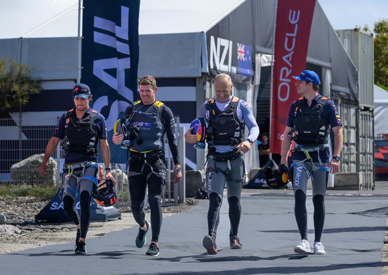 Sergio Perez and Max Verstappen, Red Bull Racing Formula One drivers, walk across the Technical Base with Tom Slingsby - Australia SailGP Team, and Jimmy Spithill - USA SailGP Team Range Rover France Sail Grand Prix in Saint Tropez, France photo copyright Jon Buckle/SailGP taken at Société Nautique de Saint-Tropez and featuring the F50 class