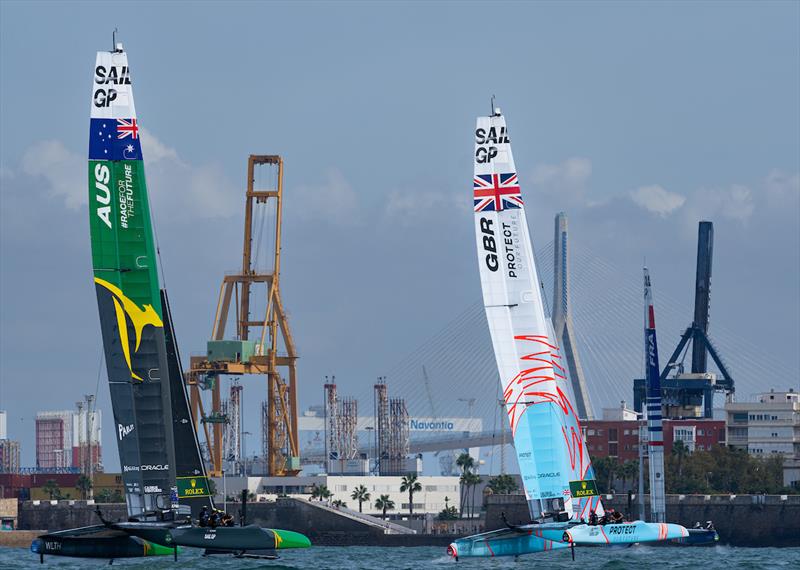 Australia SailGP Team helmed by Tom Slingsby and Great Britain SailGP Team helmed by Ben Ainslie on Race Day 2 of the Spain Sail Grand Prix in Cadiz photo copyright Bob Martin for SailGP taken at  and featuring the F50 class