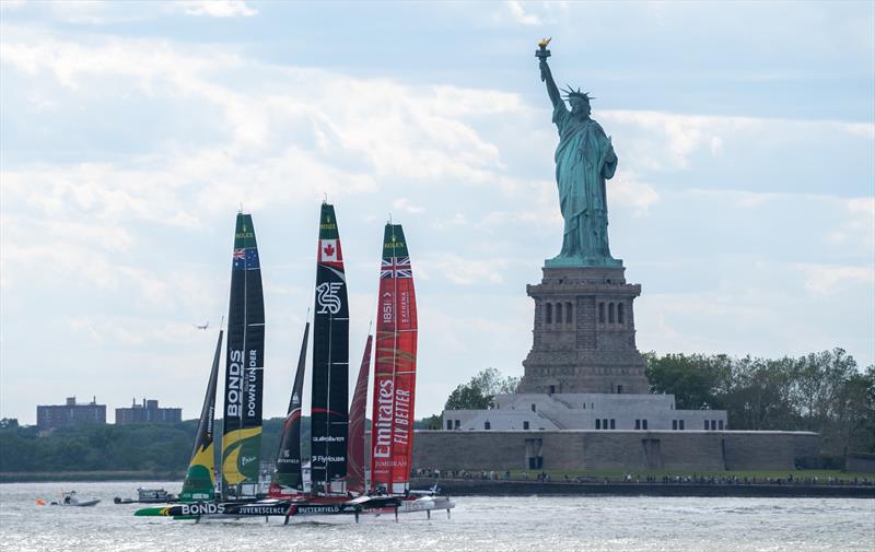 BONDS Flying Roos SailGP Team driven by Tom Slingsby leads NORTHSTAR SailGP Team driven by Giles Scott and Emirates Great Britain SailGP Team driven by Dylan Fletcher past the Statue of Liberty, on Race Day 2 of the Mubadala New York Sail Grand Prix - photo © Mike Lawrence for SailGP