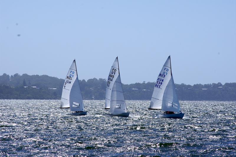 Blu Tak AUS338 retains third position, but Lupicus 60 AUS33 passes PPK NZL7 on their way to the leeward gate in race four of the Flying Dutchman 2026 Australian Championship - photo © Jeanette Severs