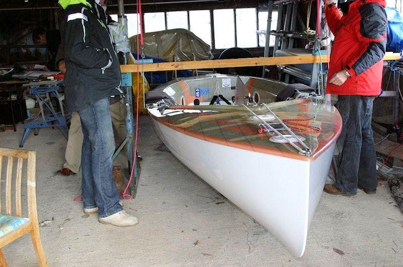 A Finn undergoing a 'swing test' - photo © Suntouched Sailboats