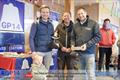 The winners showing off their silver cigarette box and the WSHC Venetian Trophy, with Mark Greenstreet, Rear-Commodore WHSC, at the P&B GP14 2026 UK Inland Championship &copy; Richard Craig / www.SailPics.co.uk
