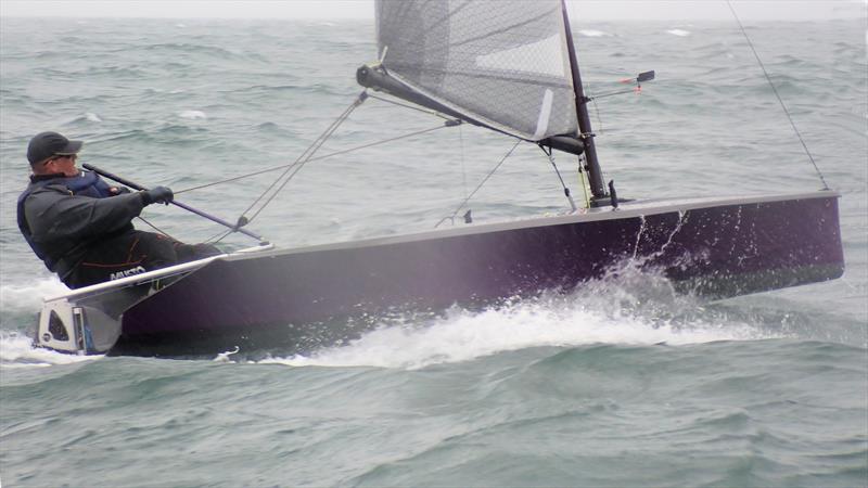 Richard Le Mare in his element at the Hadron H2 Nationals photo copyright Sarah Desjonqueres taken at Highcliffe Sailing Club and featuring the Hadron H2 class