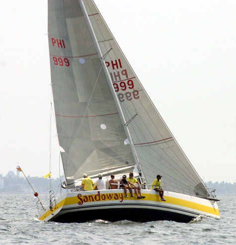 Sandoway with its all-new windward sail set of Hyde Sails during the 15th President’s Cup Regatta photo copyright Martyn Willes taken at Manila Yacht Club and featuring the  class