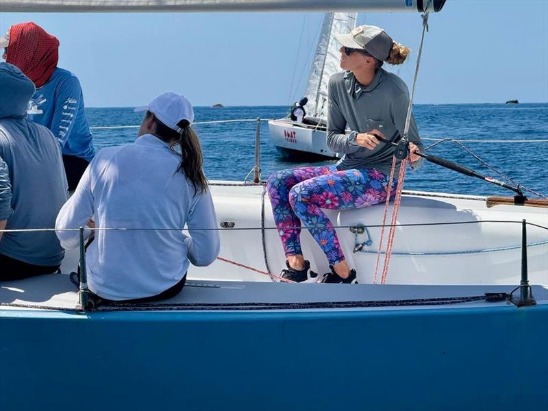 Sarah Swan takes a turn on the tiller - photo © Nikki Barnes