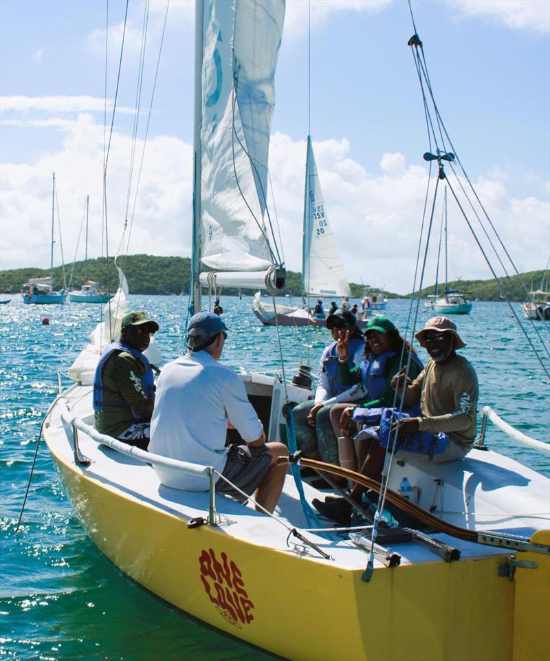 6th Annual USVI Hotel & Tourism Association Regatta - Team USVI Department of Tourism gets a pre-race briefing from STYC Coach, Maurice Kurg (second from left) photo copyright STSC / C Bareuther taken at St. Thomas Sailing Center and featuring the IC24 class