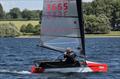 Nigel Williams checks out where Kevin Hope is - International Moth Lowrider UK Nationals at Rutland &copy; Adam Pettit