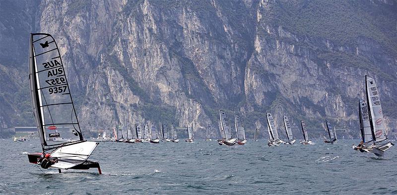 Rohan Veal Port tacking the fleet at Lake Garda in 2007 photo copyright Rohan Veal taken at  and featuring the International Moth class