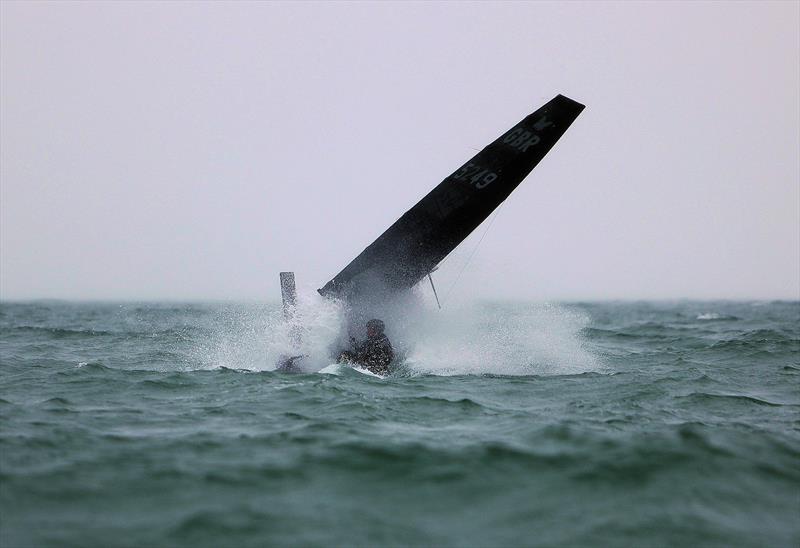 GBR 5249 Kyle Stoneham splashdown in the rain on Wetsuit Outlet International Moth UK Championship Day 4 photo copyright Mark Jardine taken at Royal Torbay Yacht Club and featuring the International Moth class