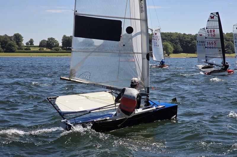 Tom Foxall chases the earliest starters - International Moth Lowrider UK Nationals at Rutland photo copyright Adam Pettit taken at Rutland Sailing Club and featuring the International Moth class