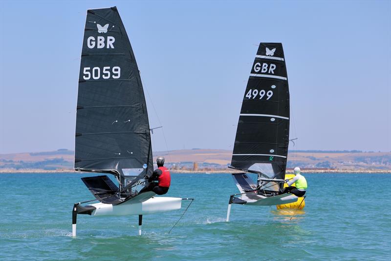 Wetsuit Outlet International Moth UK Nationals at the WPNSA Day 3 - GBR 4999 and GBR 5059 at the Race 6 windward gate - photo © Mark Jardine