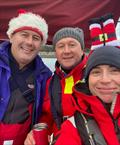 Santa hats on and mulled wine to warm the crew of Finally at the finish of the Pwllheli Santa Special © Sioned Owen