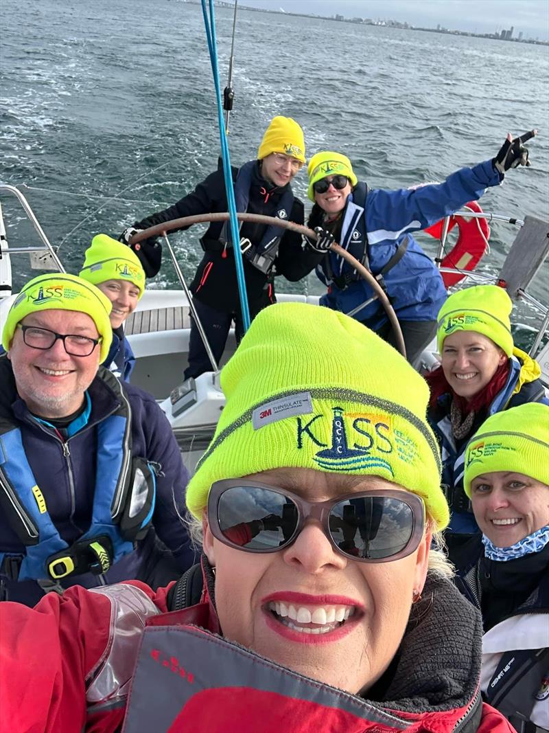 Rachel Cameron centre with the Boomer crew won the KISS Passage Photography Award photo copyright KISS Media taken at Queenscliff Cruising Yacht Club and featuring the IRC class