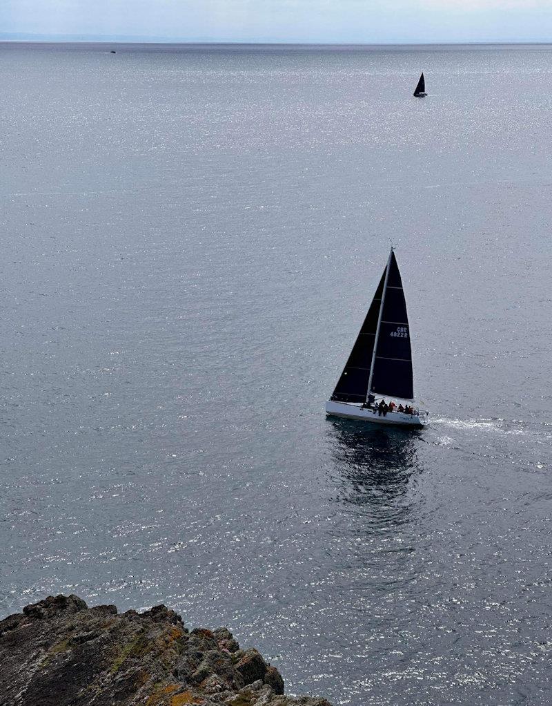 Mojito, tacking inshore to avoid the tide at Cilan Head, with Jackknife further out - 3rd Musto ISORA Welsh Coastal Race at Pwllheli - photo © Ben Hudson
