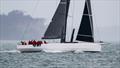 Lucky emerges from the murk to make her final approach to the finish line in Auckland - Finish Sydney Auckland Race - October 14, 2025 © Richard Gladwell - Sail-World.com/nz
