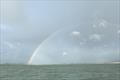 Showers provided a rainbow backdrop - Pwllheli SC Santa Special &copy; Hannah Entwistle