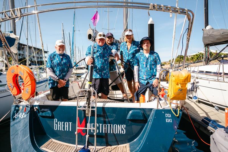 Great Xpectations crew - owner Rod Wills front and centre - SeaLink Magnetic Island Race Week 2025 photo copyright Revolution Production taken at Townsville Yacht Club and featuring the IRC class