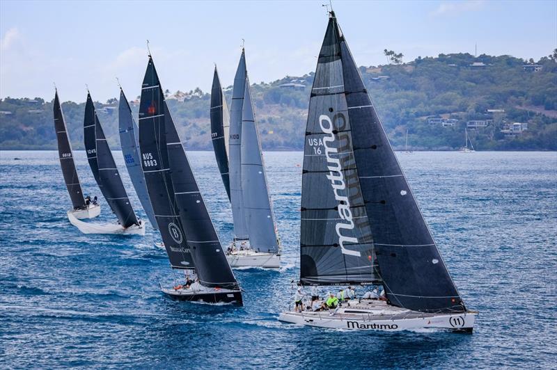Ikon (white yacht behind Maritimo) at the Australian Sailing Champs in 2022 photo copyright Salty Dingo / Hamilton Island Race Week taken at Whitsunday Sailing Club and featuring the IRC class