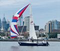 Riverton Yacht Club's Jon Burnham's Defiant crosses the finish line for a win &copy; Irina Bernatsky