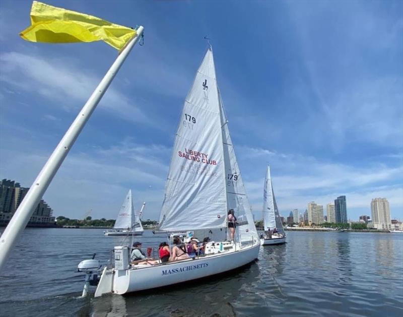 J/27 Massachusetts crosses the finish line in the 2024 Philadelphia Cup Regatta photo copyright Rian Bareuther taken at Liberty Sailing Club and featuring the J/27 class