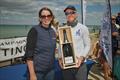 Giles Chipperfield collects the top prize, a jeroboam of Taittinger Champagne - Taittinger Royal Solent YC Regatta &copy; Tim Jeffreys Photography
