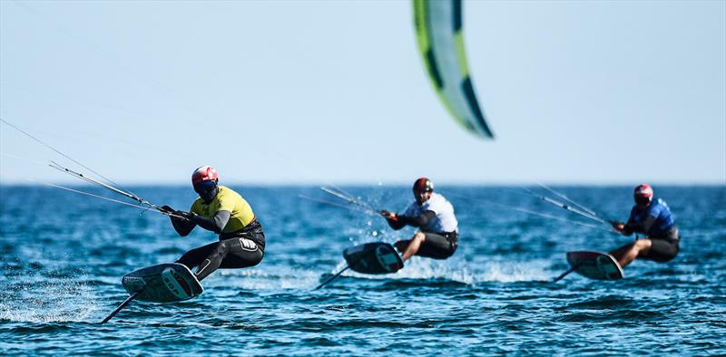Max Maeder in yellow leading Max Nocher and Lorenzo Boschetti (blue) - 2023 Kitefoil World Series photo copyright IKA Media / Robert Hajduk taken at  and featuring the Kiteboarding class